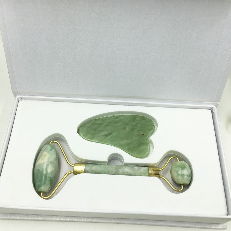 Green stone gua sha tool